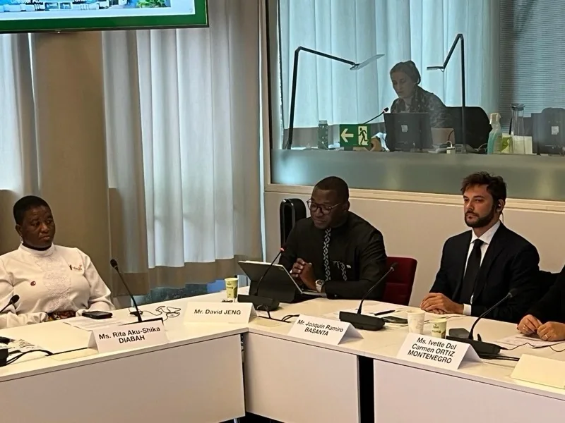 Participants at a round-table meeting
