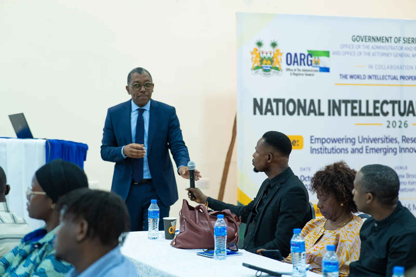 A presenter speaking during an IP Week session