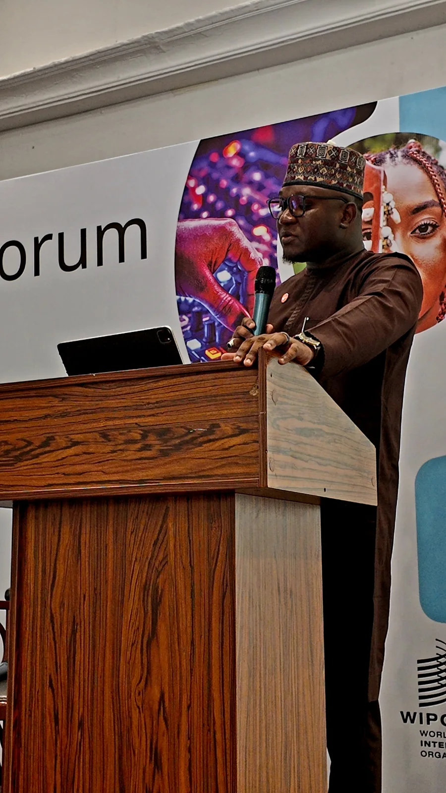 A presenter at the forum lectern